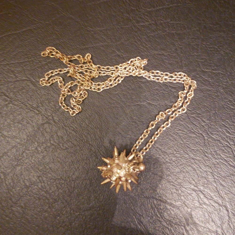 Spiked charm with long sterling silver chain